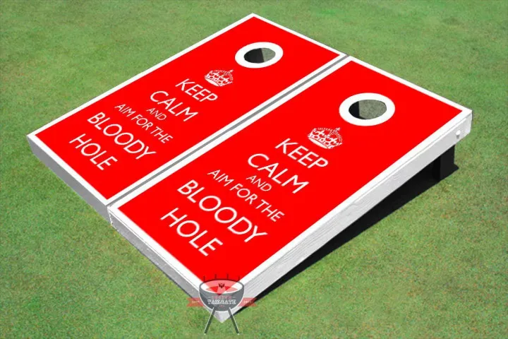 A bright red cornhole board (no, for real) that reads "KEEP CALM AND AIM FOR THE BLOODY HOLE" 